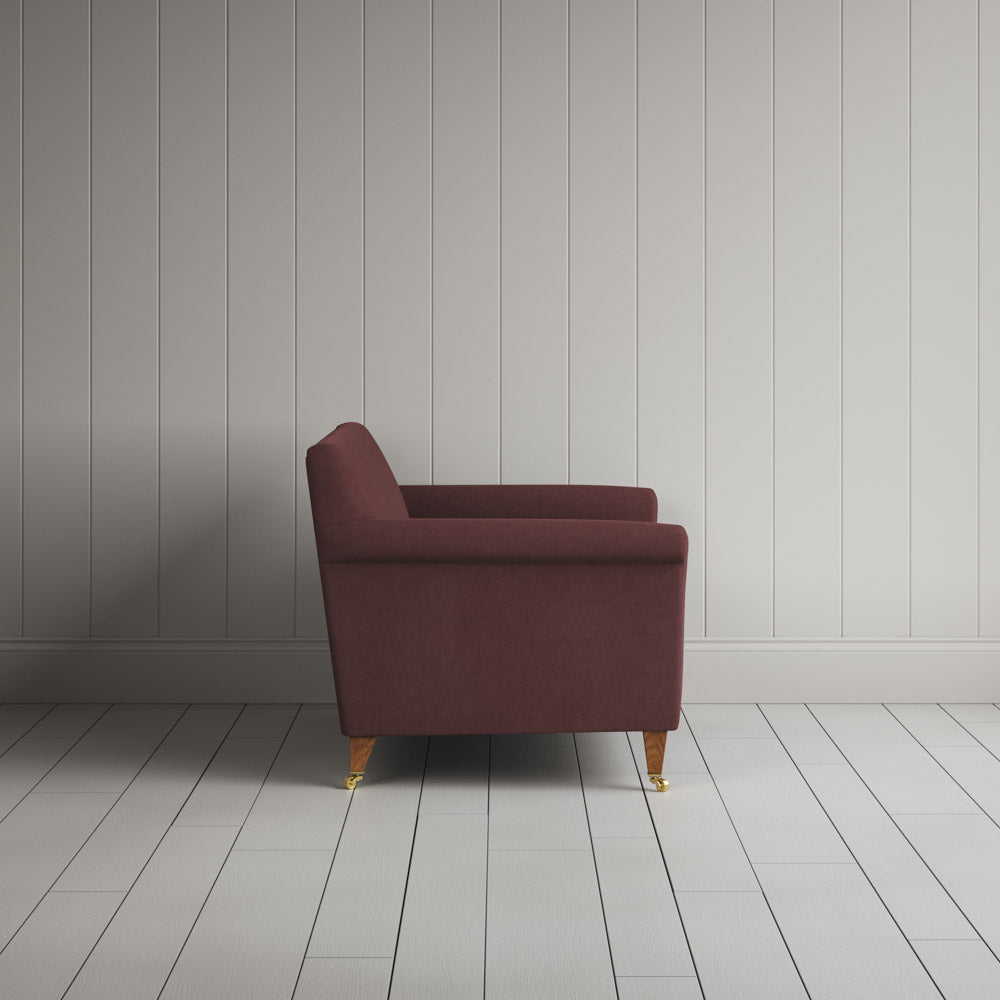  Side profile of the Idler seat in Damson Laidback Linen by Nix. 