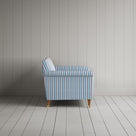 Side profile of the Idler seat in blue cotton linen showing its clean lines by Nix.