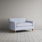 Angled view of the Aqua Brown ticking Idler seat by Nix.
