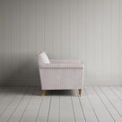 Side profile of the striped Idler love seat by Nicola Harding