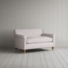 Elegant angled view of the Idler BIG LOVE seat in Berry stripes, designed for luxury interior settings by Nicola Harding.