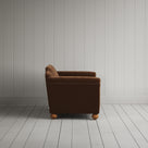 Side profile of the Tobacco corduroy Dolittle love seat