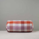 Front View of Bask Bolster Cushion in Checkmate Cotton, Berry - Nicola Harding