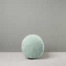 Side View of Bask Bolster Cushion in Laidback Linen, Sky - Nicola Harding
