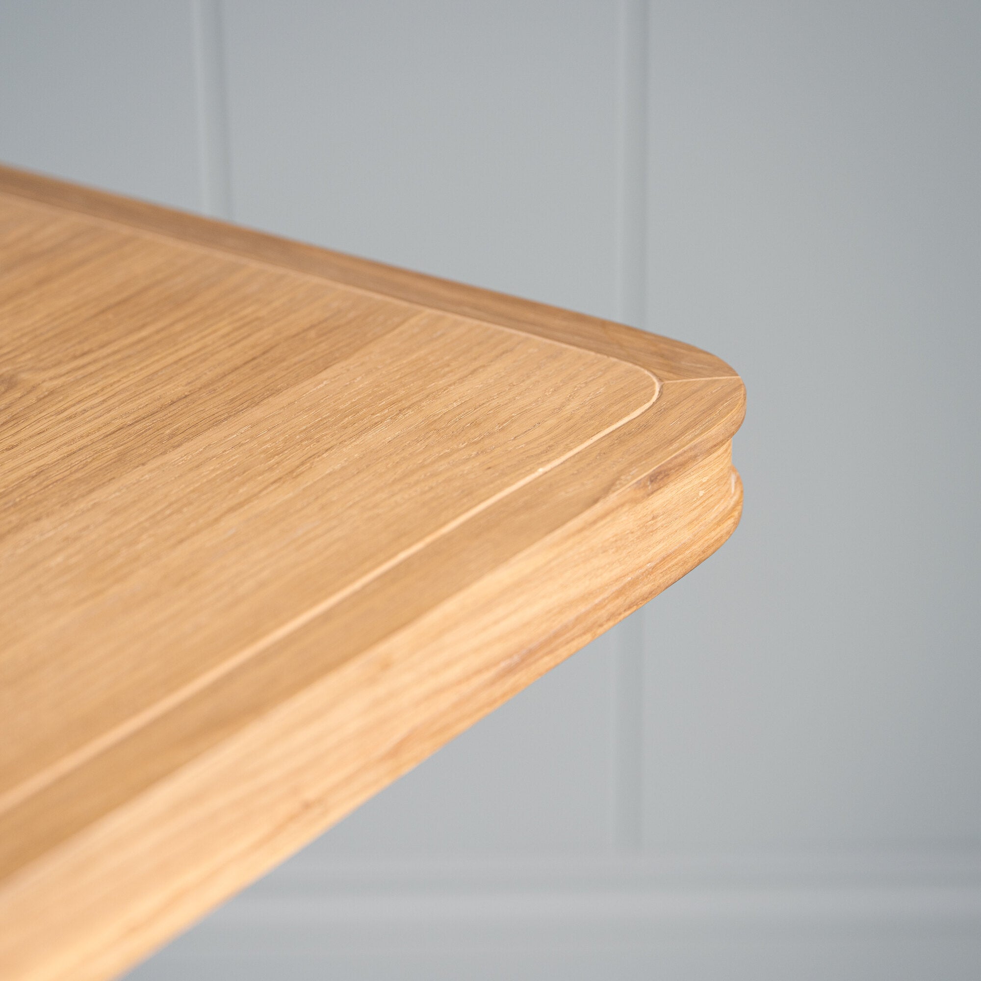  Edge Design closeup of Tuck In Rectangular Dining Table in Oak 