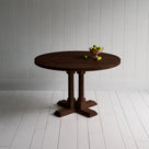 Small beautiful round Smoky Stained Oak Wood dining table, With Fruit basket, manufactured by NiX in London.