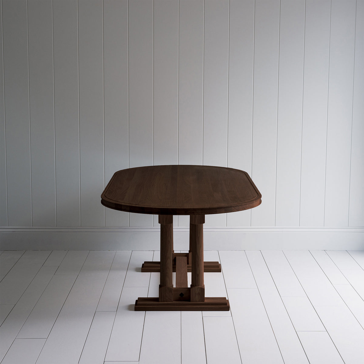 Side View of Tuck-In Oval Dining Table in Smoky Stained Oak - By NiX
