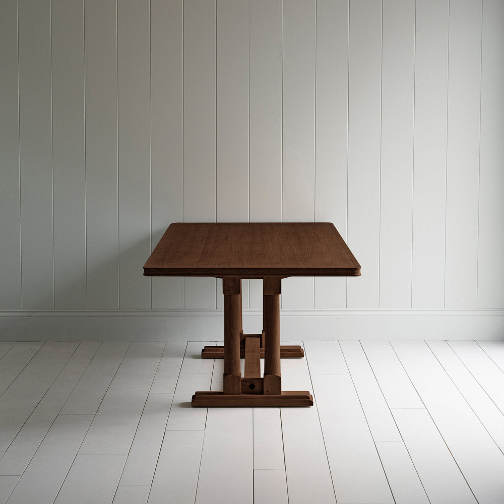 Side View of Tuck In rectangular dining table in smoky stained oak wood, by NiX.