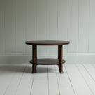 Round coffee table in smoky stained oak Manufacture in London By NiX Furniture Studio
