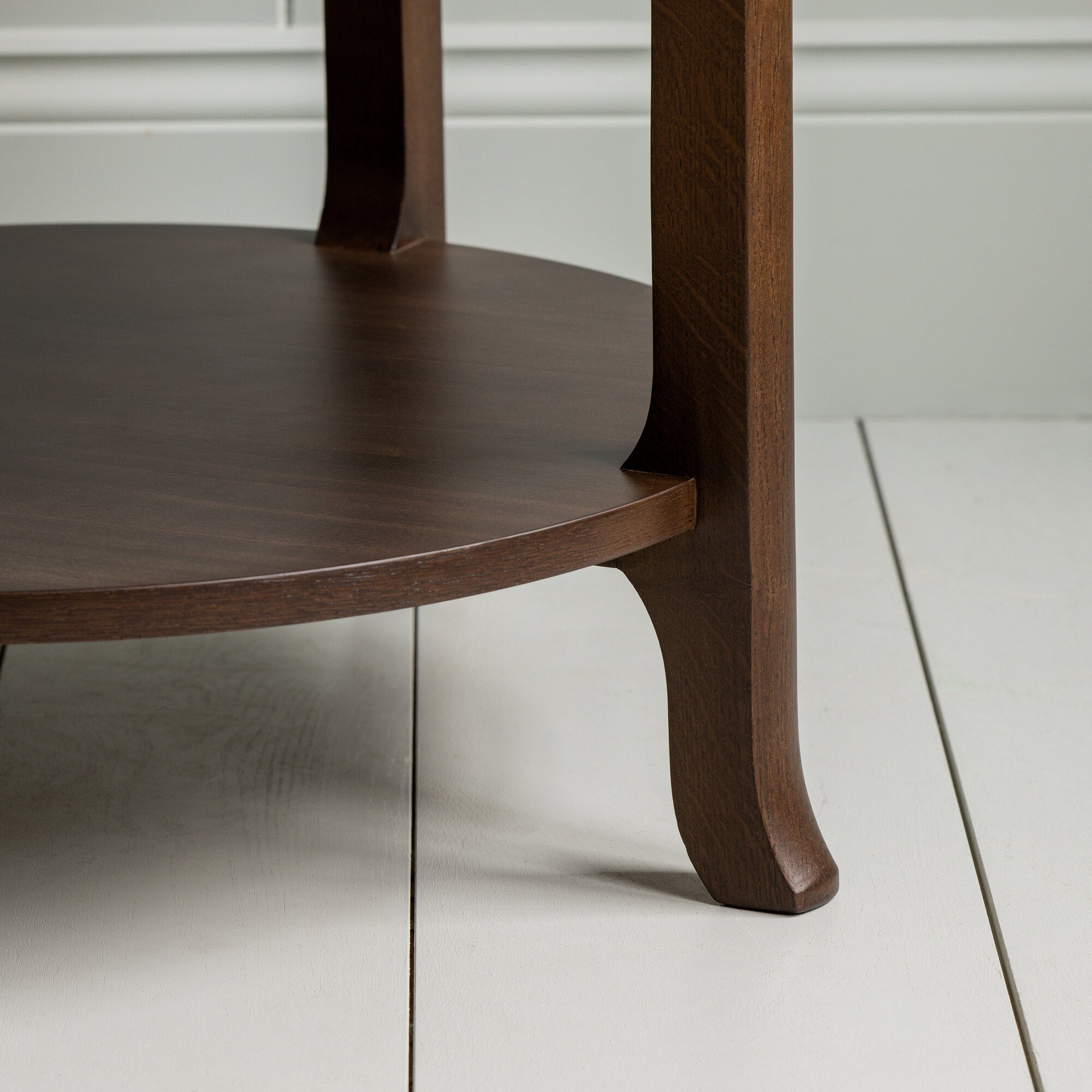  Leg Design Closeup of Round Perk Coffee Table, Smoky Stained Oak - By Nicola Harding & Co. 