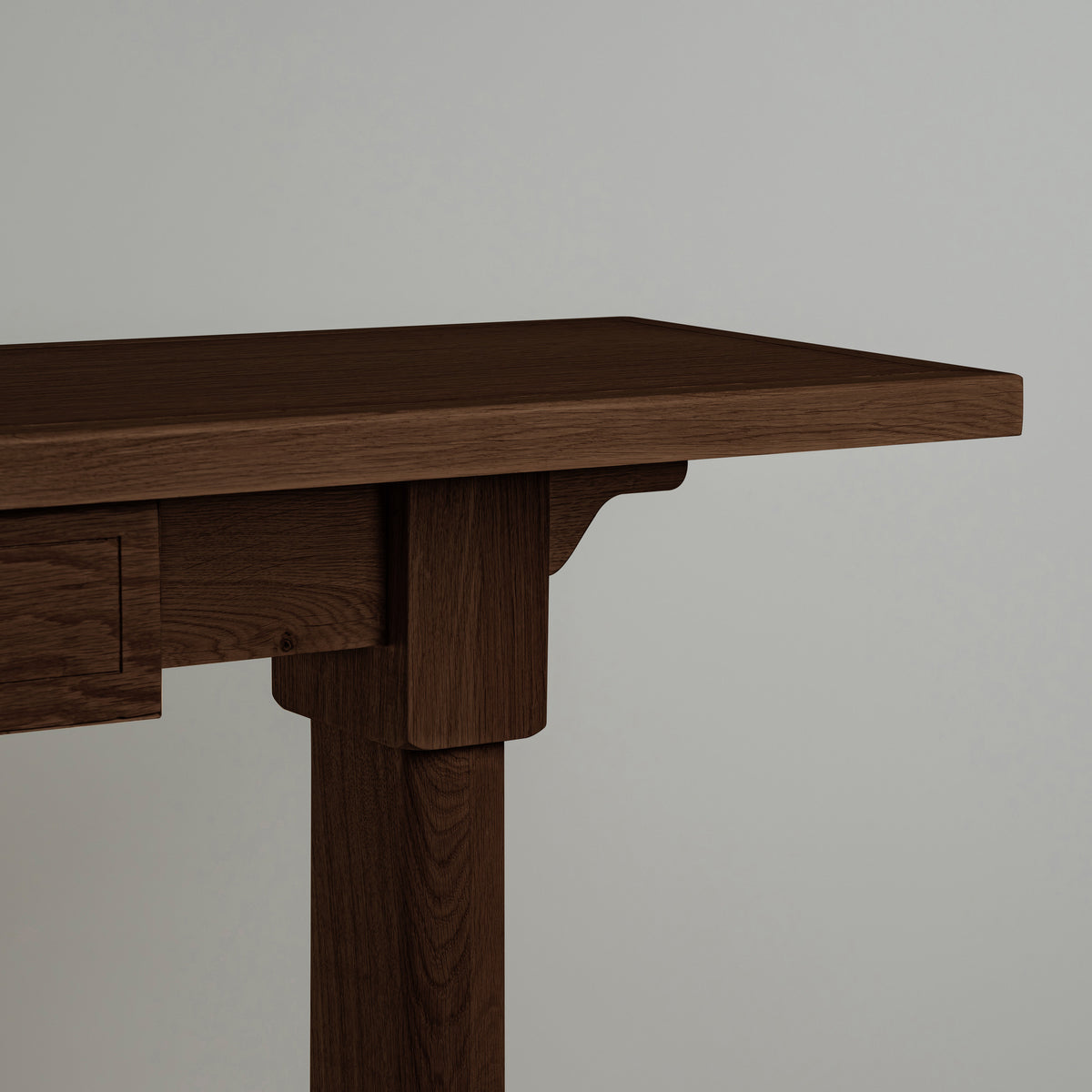 The design of the Keepsake Console Table is based on smoky stained oak, highlighting the texture and craftsmanship.