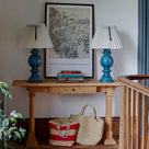 Keepsake Console Table, Oiled Oak Decorated With 2 Lamps, books, and a painting by Nicola Harding & Co.