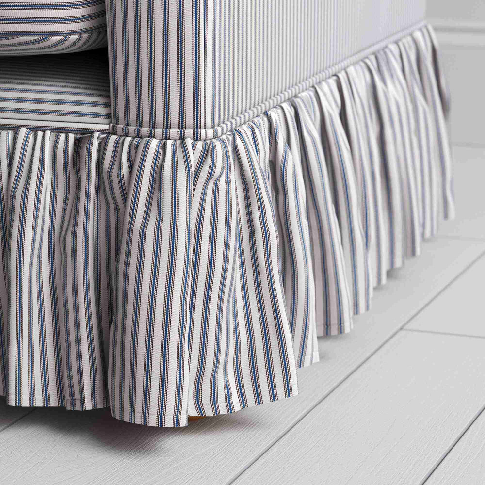 Focus on the romantic pleated cotton lower trim crafted by Nicola Harding design.