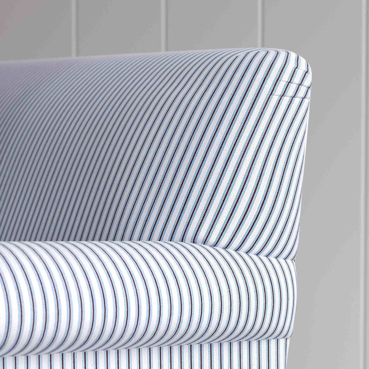 Back profile of a premium striped cotton love seat from the Nicola Harding curtain call collection.