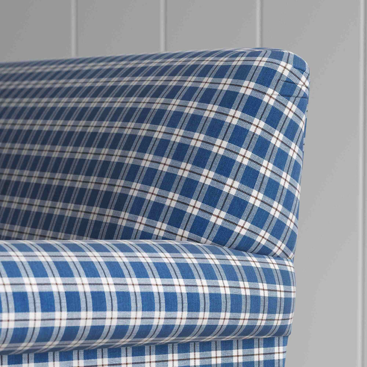 Back details of a premium plaid cotton love seat by Nicola Harding.