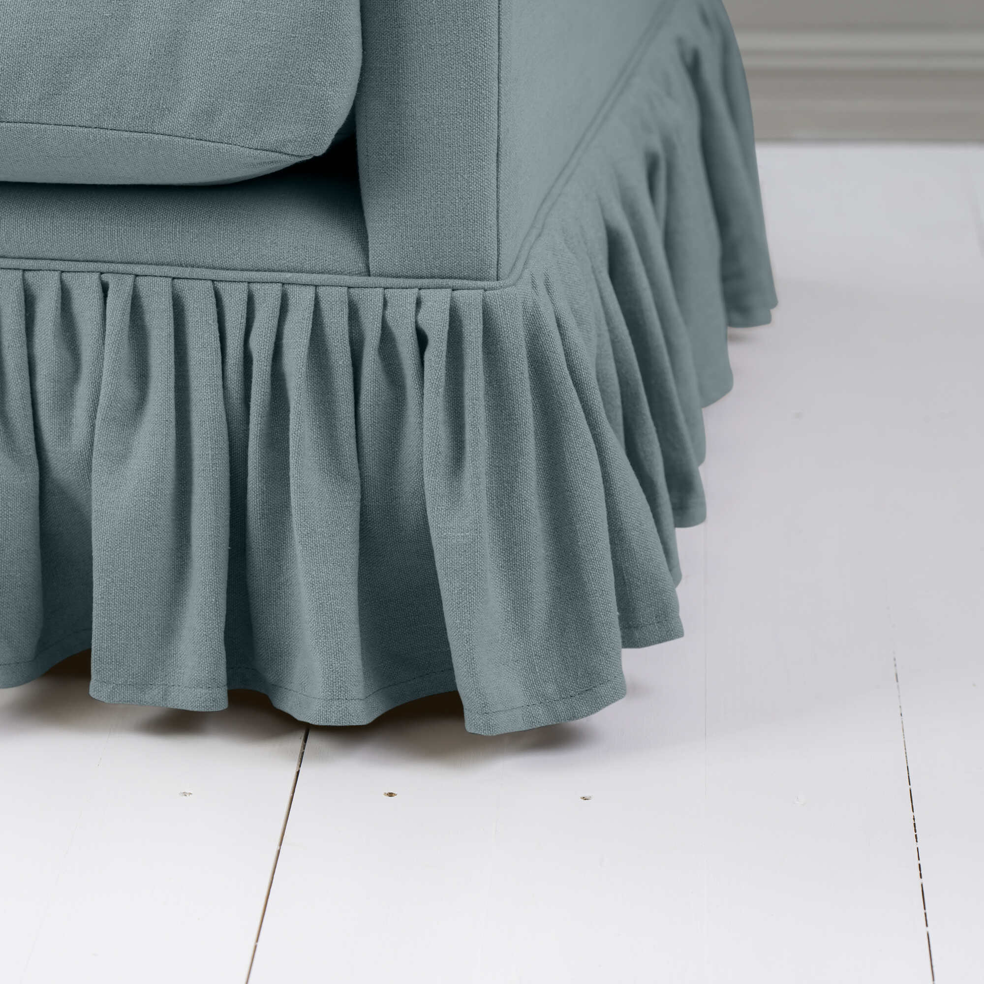  Ruffled skirt detail on Curtain Call love seat in Laidback Linen Cerulean by Nicola Harding 