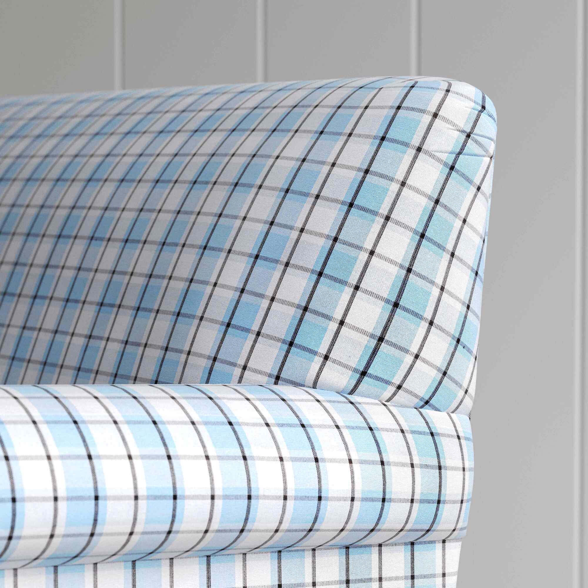  Clean rear view showing the straight back silhouette of the Curtain Call sofa by NiX. 