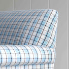 Clean rear view showing the straight back silhouette of the Curtain Call sofa by NiX.
