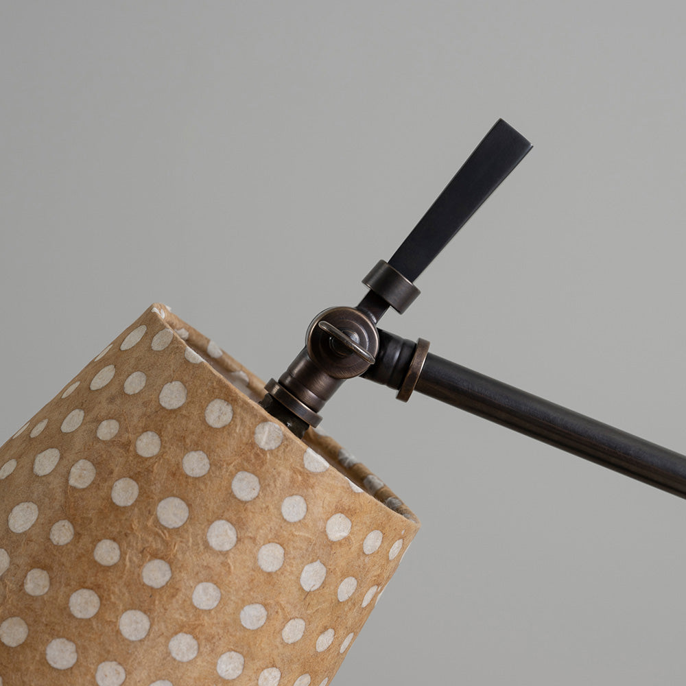  Focused Table Lamp Base in Waxed Brass, Closeup of Lampshade Holder With Focused Empire Batik Paper Lamp Shade in Spotty Dotty Tan - Nicola Harding 