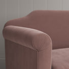 Close-up of the tailored scroll armrest on the Dolittle sofa by NiX.