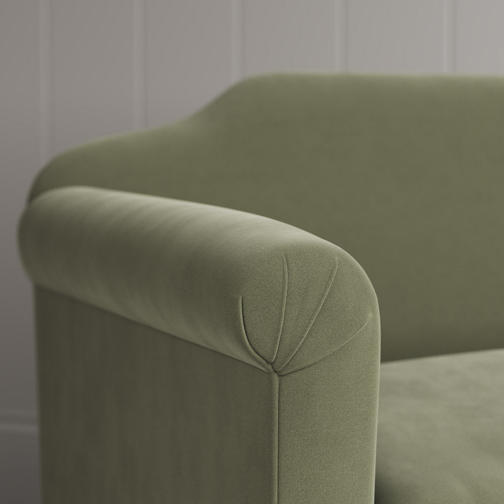 Macro detail of premium upholstery stitch lines on a Nicola Harding design love seat.