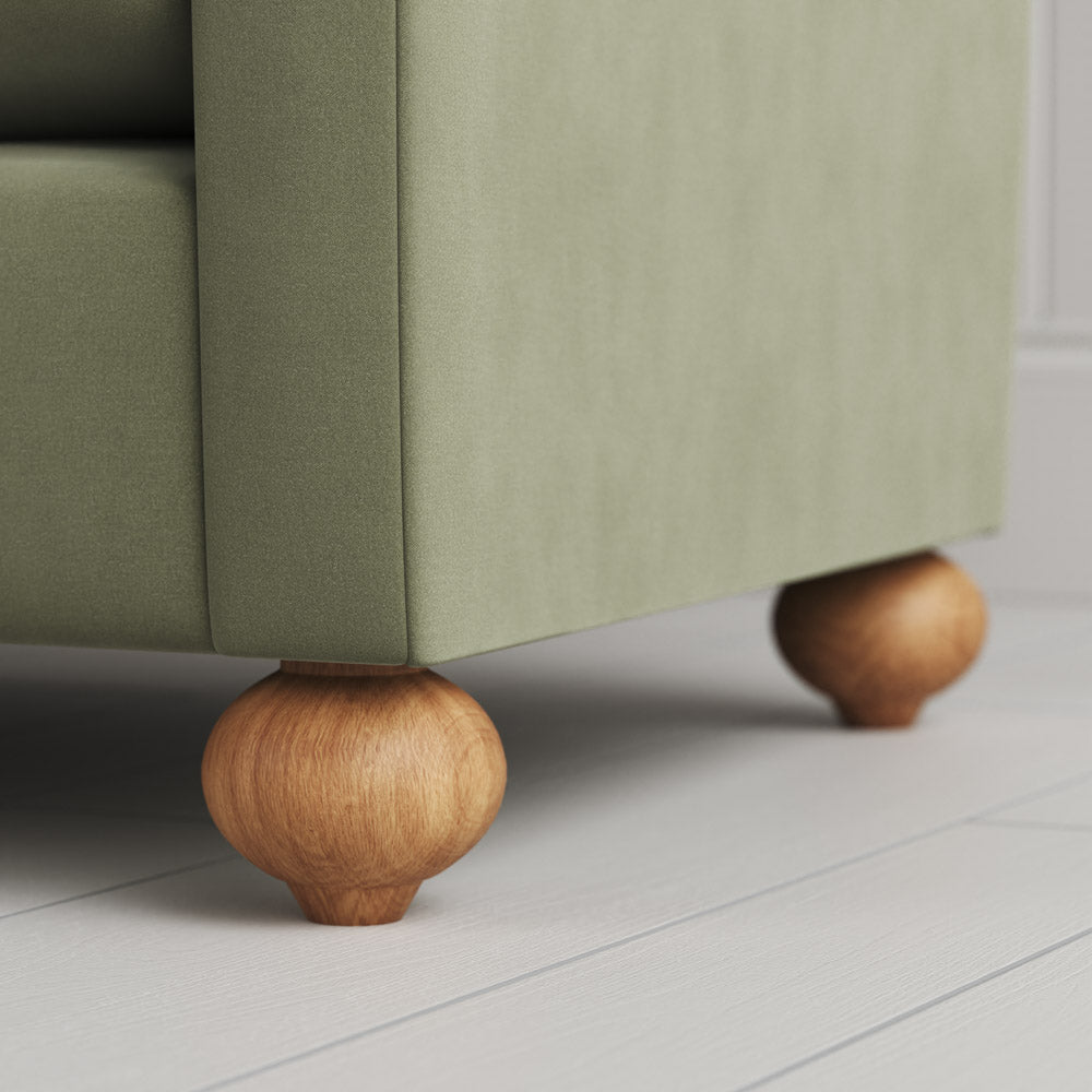  Detail of the spherical timber feet on the NiX furniture love seat. 