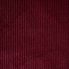 Flat lay of Cherry Classic Corduroy, a warm red ribbed cotton fabric for luxury seating.