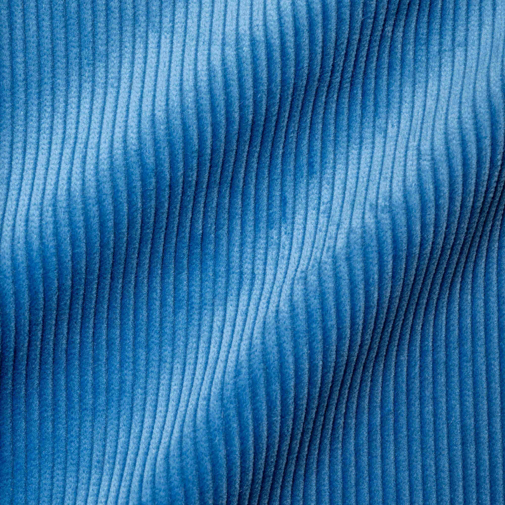 Flat lay of Harbour Blue Classic Corduroy, a rich navy ribbed fabric for luxury seating.