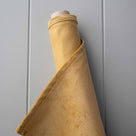 Roll of Wheat Classic Corduroy fabric for Nicola Harding seating range.