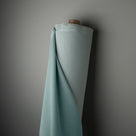 Blue fabric roll, perfect for crafting or sewing projects.