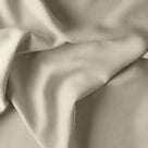 Draped Dove linen fabric showing the soft weave by Nix.
