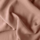 Detailed view of folded Roseberry Laidback Linen material by Nicola Harding.
