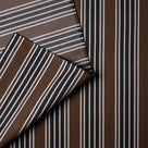 Detailed view of folded Charcoal Regatta cotton material by Nicola Harding.