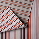 Close-up of folded Berry Slow Lane cotton linen material by Nicola Harding.