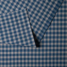 Close-up of the folded plaid cotton material used by Nix.