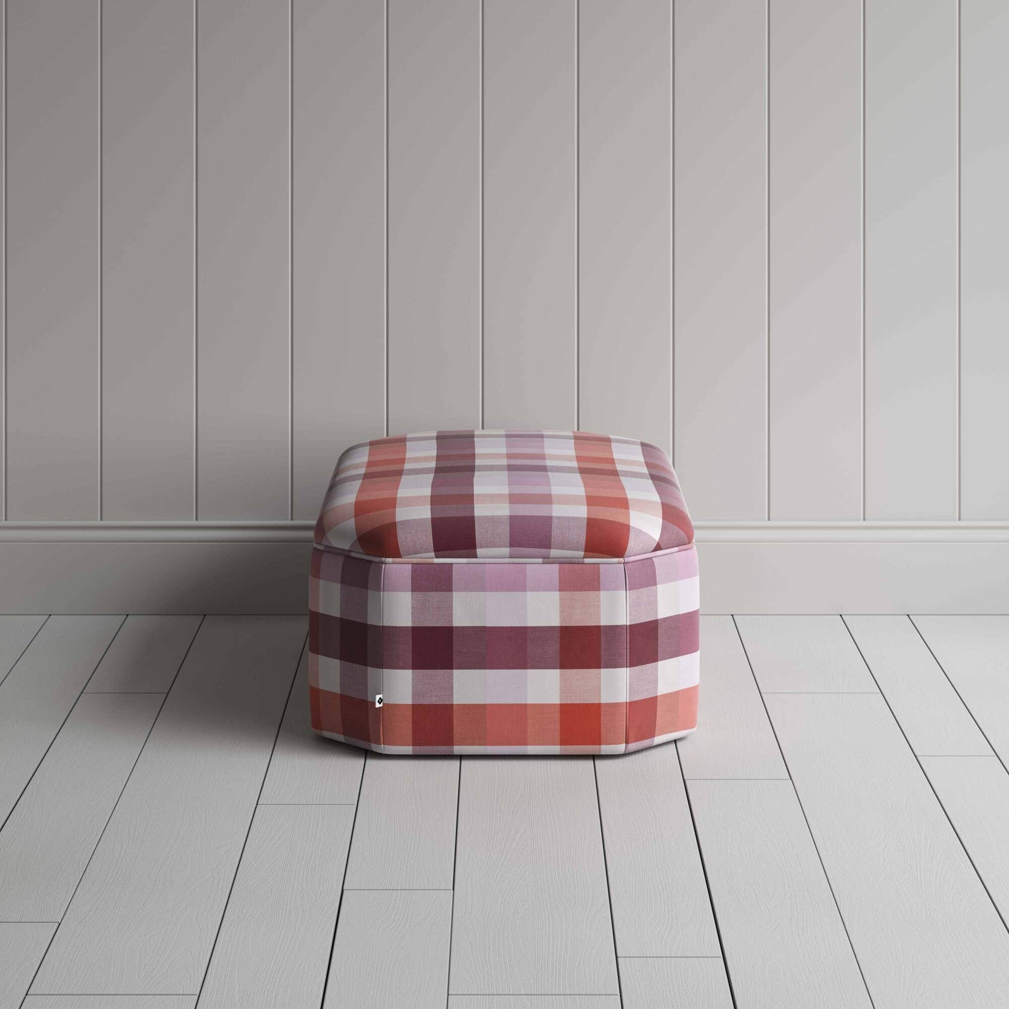  Side View of an Ottoman in Checkmate Cotton, Berry - Nicola Harding 