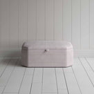 Stylish striped ottoman against white flooring. Front View - NiX