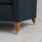 Tapered feet and castors on the Midnight linen Idler seat by Nix.