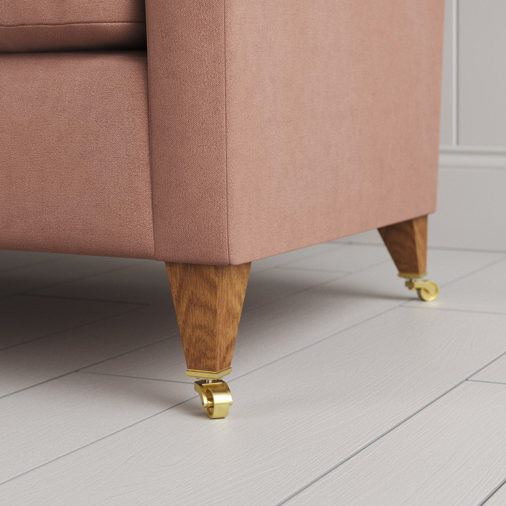 Detail of the feet and castors on Roseberry linen Idler by Nix. 