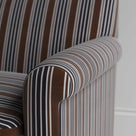 Close-up of the tailored armrest on the Charcoal Idler by Nix.