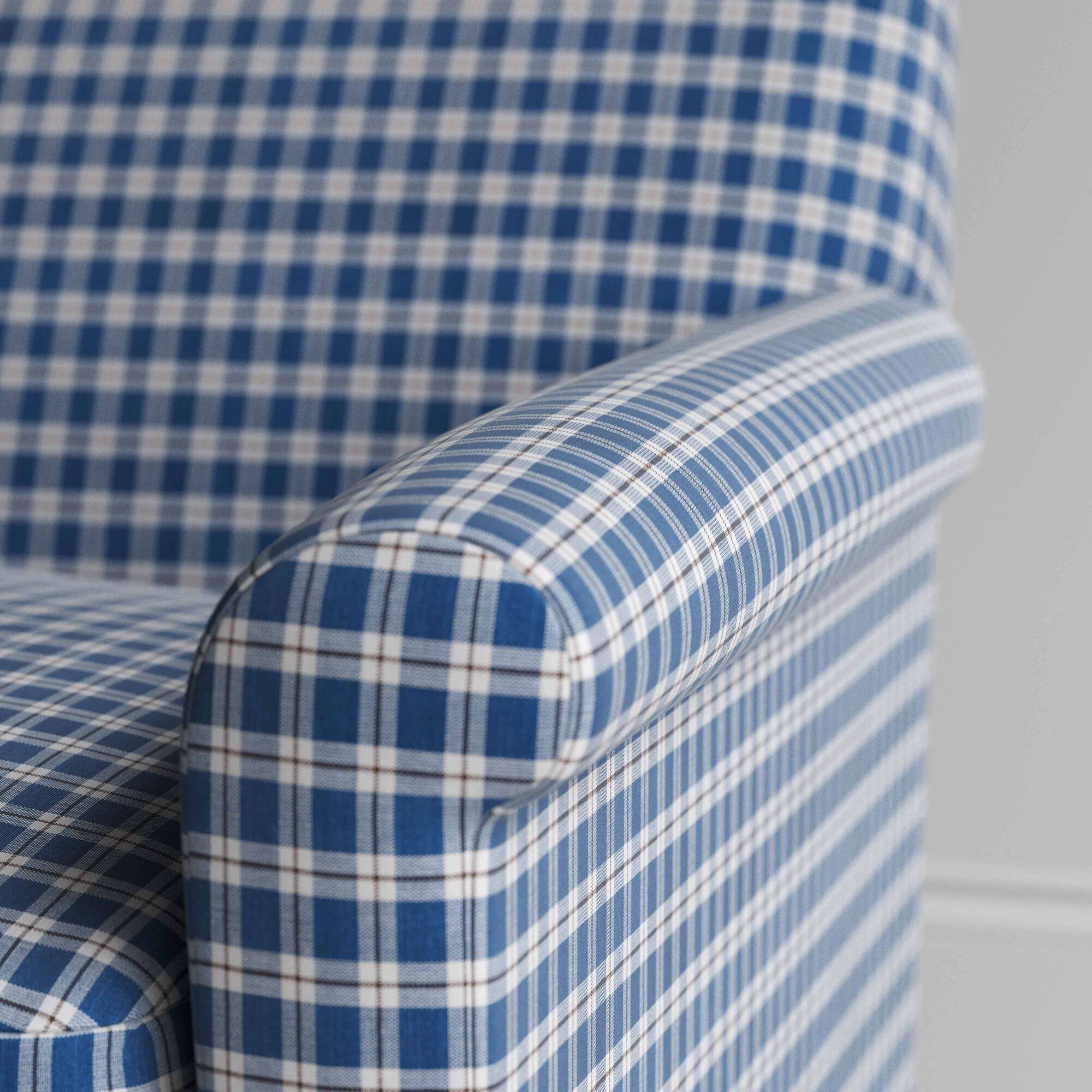  Detail of the upholstered armrest showcasing the precise stitching and refined British craftsmanship by NiX 
