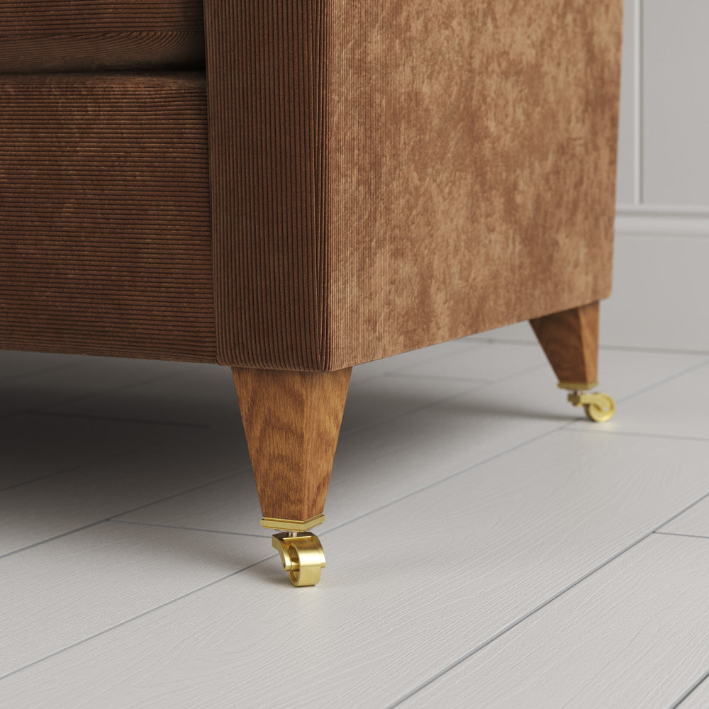 Idler sofa close-up detail of tapered timber legs with castors by NiX.