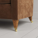 Idler sofa close-up detail of tapered timber legs with castors by NiX.