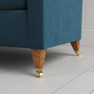 Idler sofa tapered leg and caster wheel in Velvet Aegean by NiX