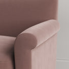 Close-up of Velvet Dusky Pink love seat armrest by Nicola Harding
