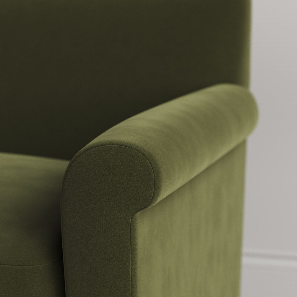 Close-up of Velvet Juniper love seat armrest by Nicola Harding
