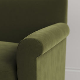 Close-up of Velvet Juniper love seat armrest by Nicola Harding