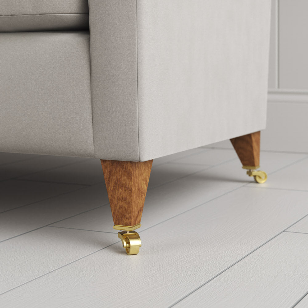  Tapered feet and castors on the Moonstone velvet Idler seat by Nix. 