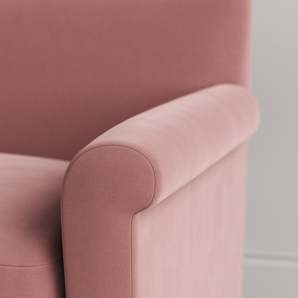  Close-up of the tailored armrest on the Rose velvet Idler by Nix. 