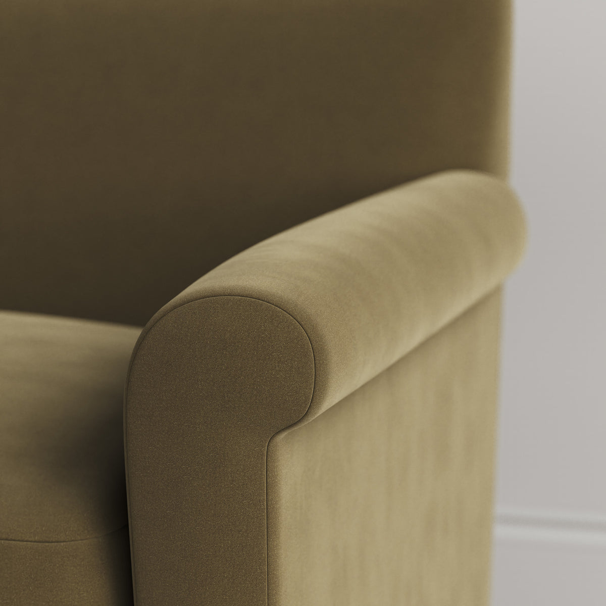 Close-up of the tailored armrest on the Sepia velvet Idler by Nix.